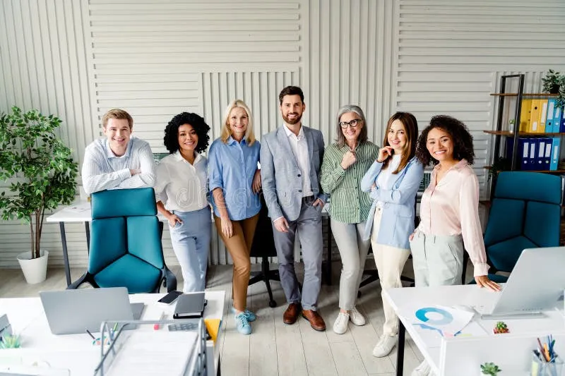 A team standing together in an office setting