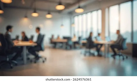 A professional workplace environment with a collaborative team meeting in the background.