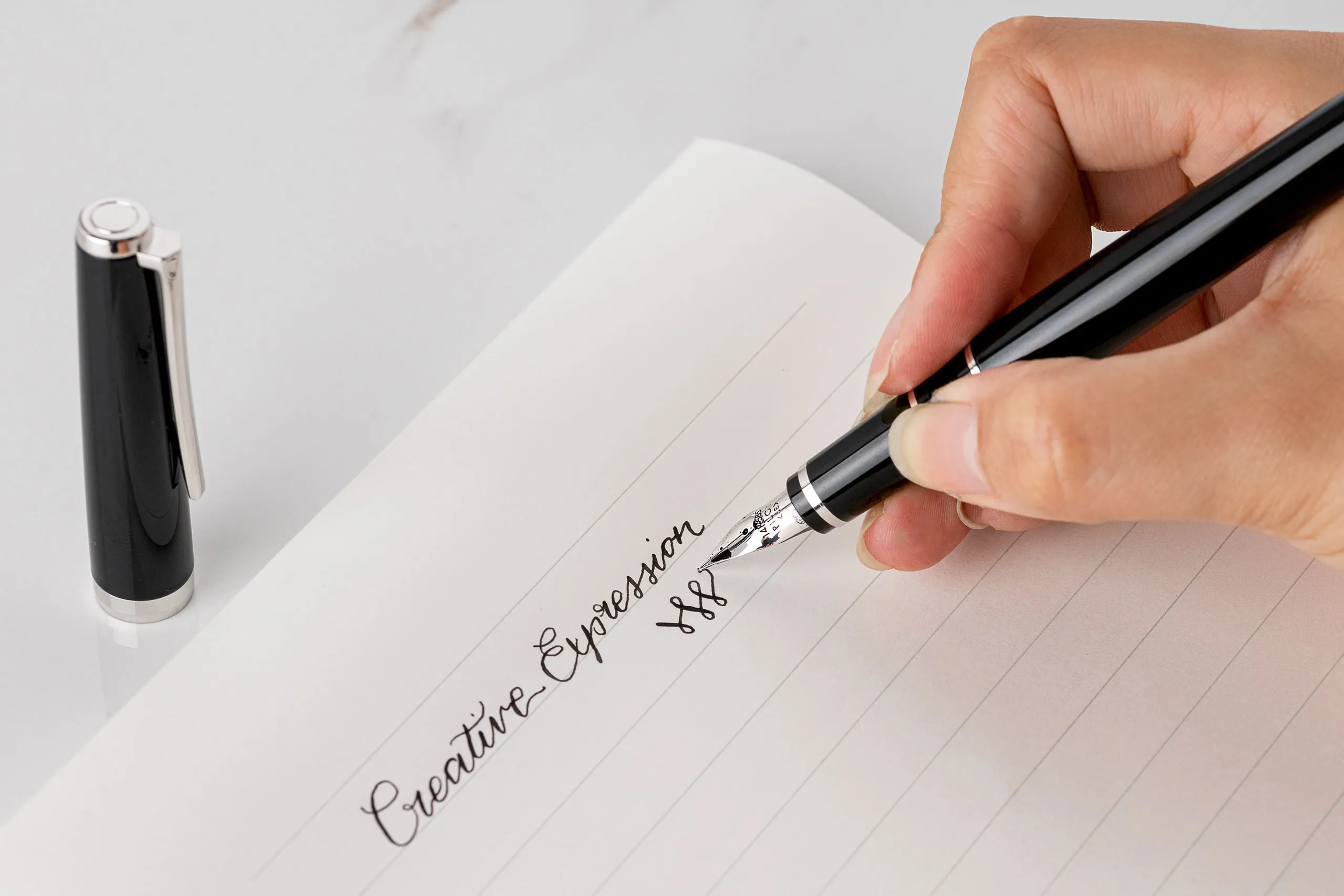 Writing a sympathy message on a card