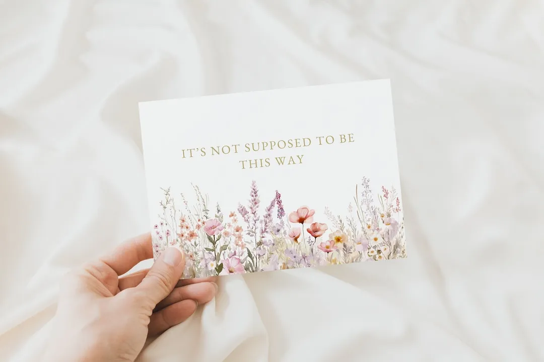 A blank sympathy card with an envelope